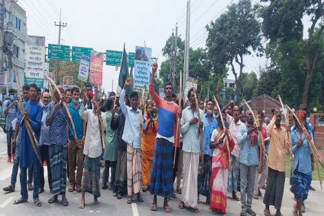 সাঁওতাল হত্যার বিচার ও ইপিজেড না করার দাবিতে বিক্ষোভ মিছিল